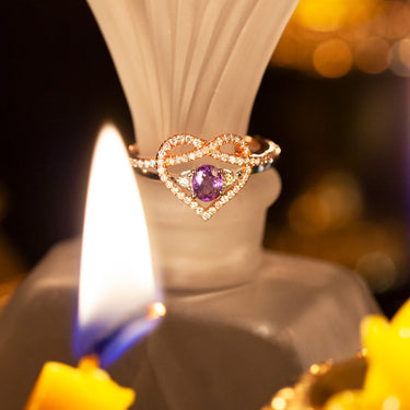 18k white and rose gold 2-piece ring set featuring natural alexandrite and diamond heart ribbon design